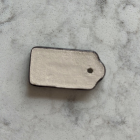 Coach Tag light cream color - Picture 2 of 2